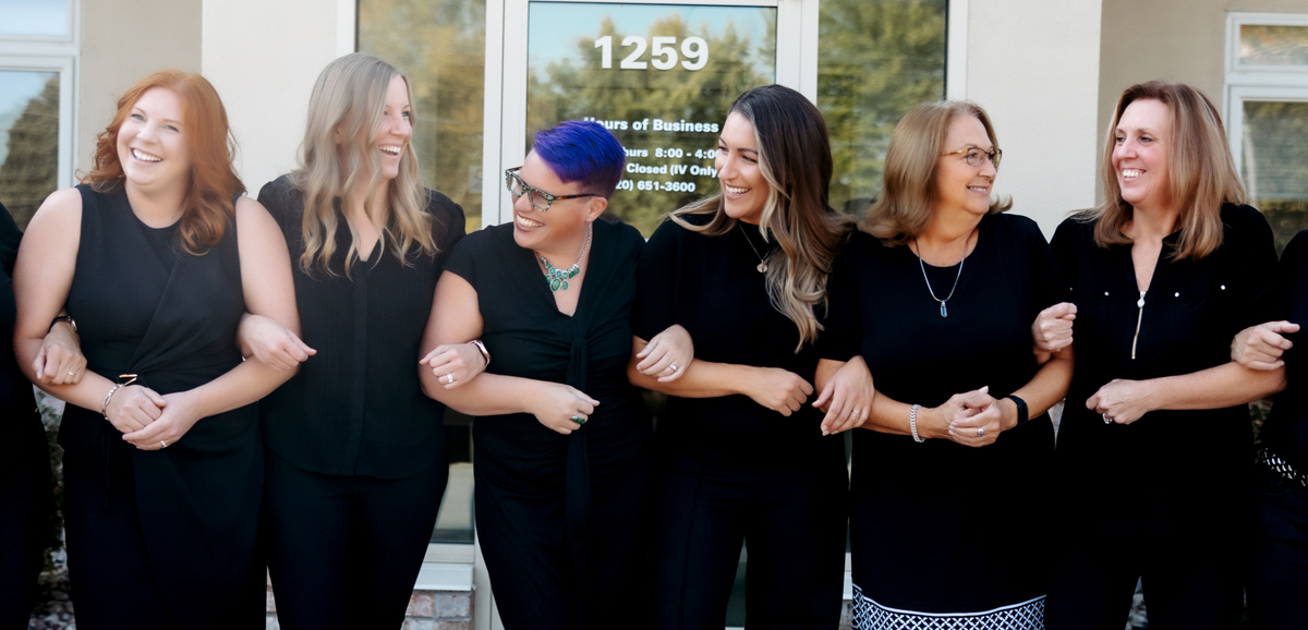The Green Medicine of Wisconsin care team, including Evelyn (Evey) Andersen, MSN, APRN, FNP-C and Dr. Jamie Lorrigan, DNP, APRN, outside the integrative and functional medicine clinic at 1259 West 20th Ave, Oshkosh, WI